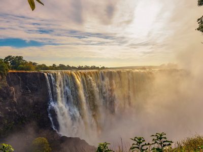 Sunset,At,The,Victoria,Falls,On,Zambezi,River,Located,Between